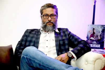 Director H.E. Amjad Khan.