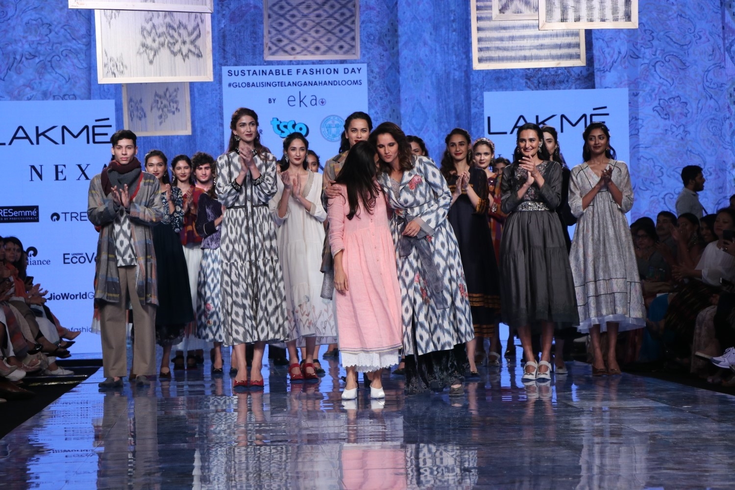 Mumbai: Indian Tennis star and showstopper Sania Mirza and other models with designer Rina Singh on Day 3 of the Lakme Fashion Week Summer/Resort 2020, in Mumbai on Feb 13, 2020. (Photo: IANS)