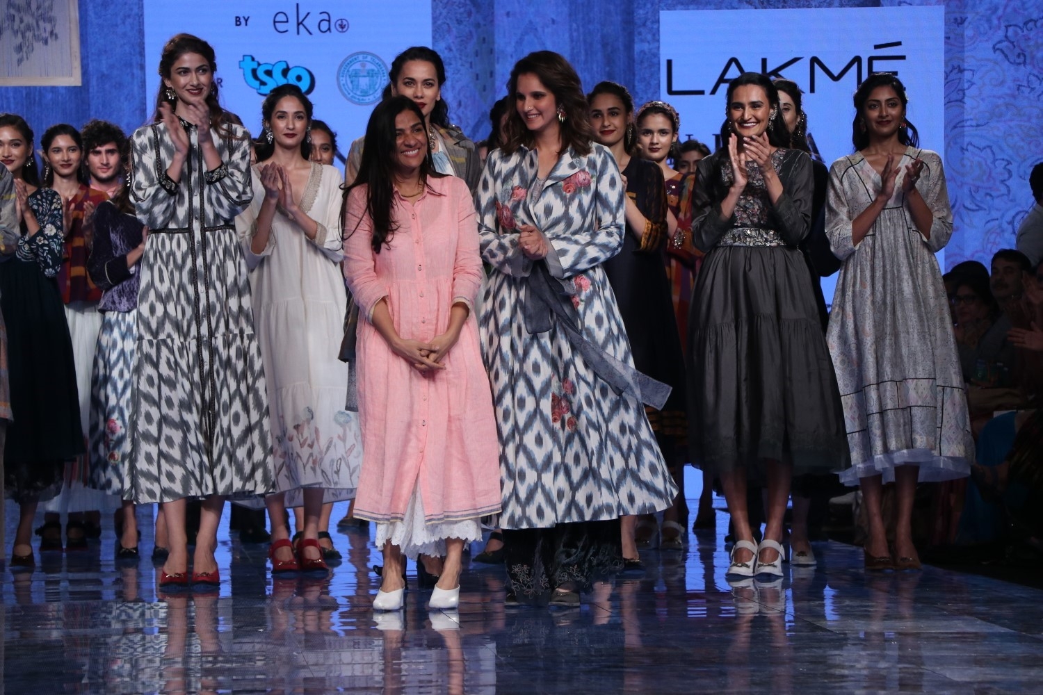 Mumbai: Indian Tennis star and showstopper Sania Mirza and other models with designer Rina Singh on Day 3 of the Lakme Fashion Week Summer/Resort 2020, in Mumbai on Feb 13, 2020. (Photo: IANS)