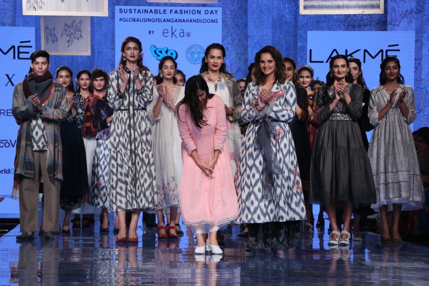 Mumbai: Indian Tennis star and showstopper Sania Mirza and other models with designer Rina Singh on Day 3 of the Lakme Fashion Week Summer/Resort 2020, in Mumbai on Feb 13, 2020. (Photo: IANS)