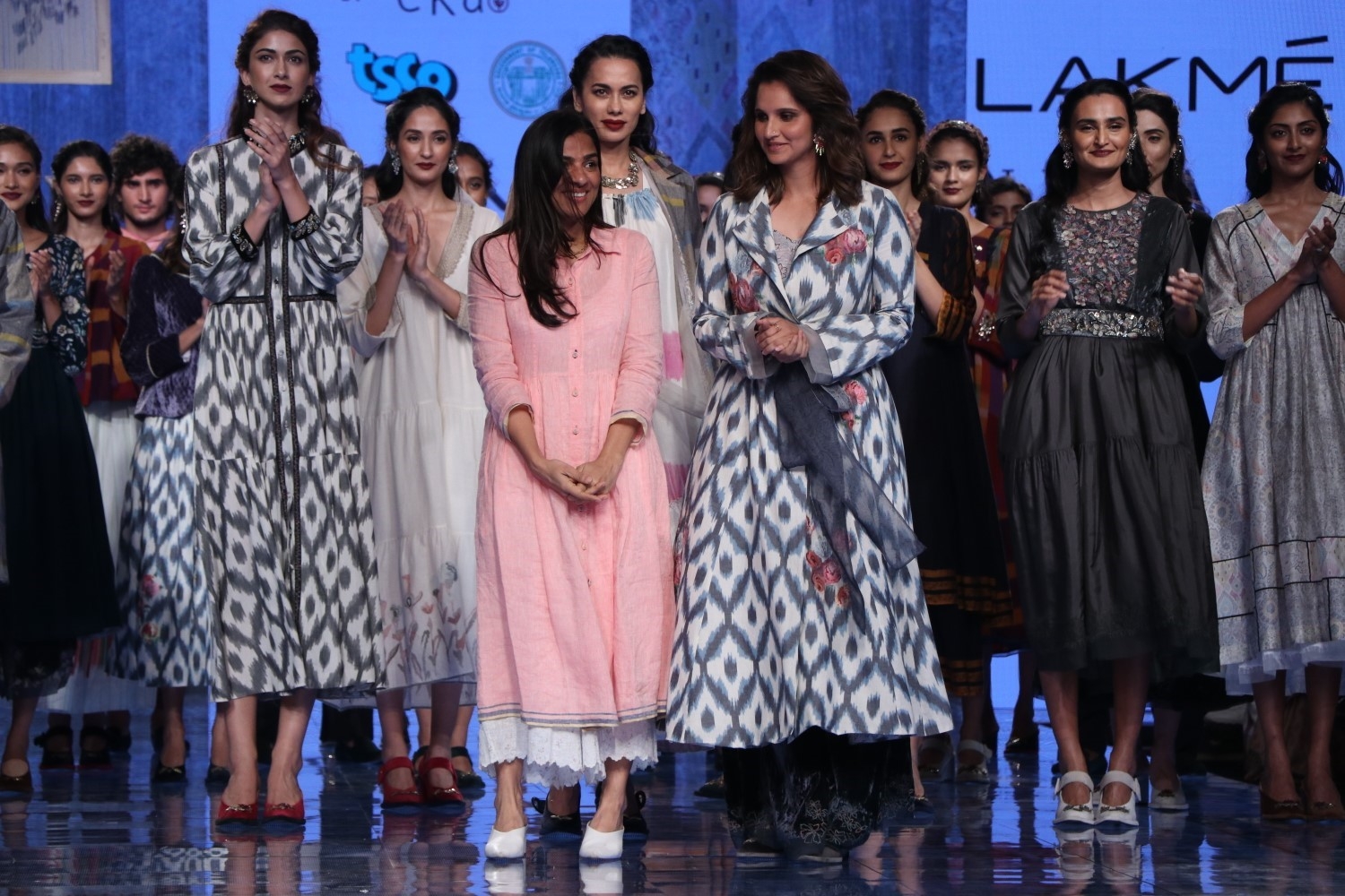 Mumbai: Indian Tennis star and showstopper Sania Mirza and other models with designer Rina Singh on Day 3 of the Lakme Fashion Week Summer/Resort 2020, in Mumbai on Feb 13, 2020. (Photo: IANS)