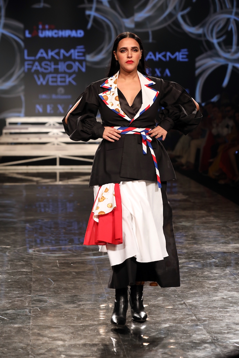 Mumbai: Actress Neha Dhupia showcases the creation of Ajio on Day 2 of the Lakme Fashion Week Summer/Resort 2020, in Mumbai on Feb 12, 2020. (Photo: IANS)