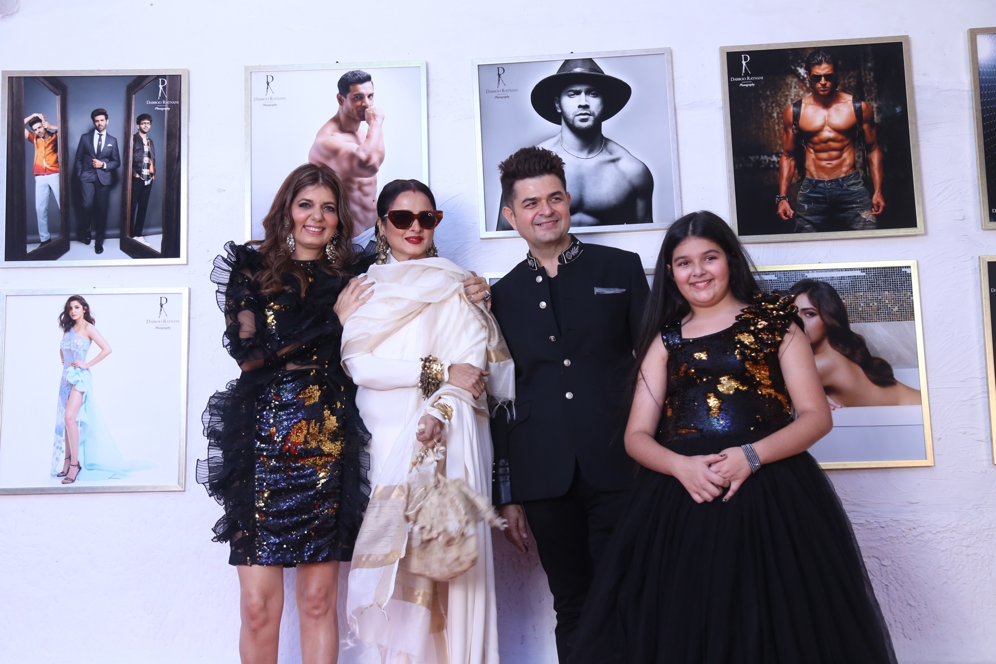 Mumbai: Fashion photographer Dabboo Ratnani with actress Rekha and his wife Manisha D Ratnani and daughter Myrah Ratnani at his calendar launch in Mumbai on Feb 17, 2020. (Photo: IANS)