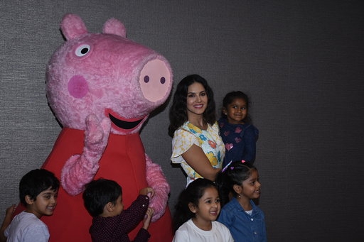 Mumbai: Actress Sunny Leone with her daughter  Nisha Kaur Weber at Viacom 18 'Peppa Pig Musical' event in Mumbai on March 7, 2020. (Photo: IANS)