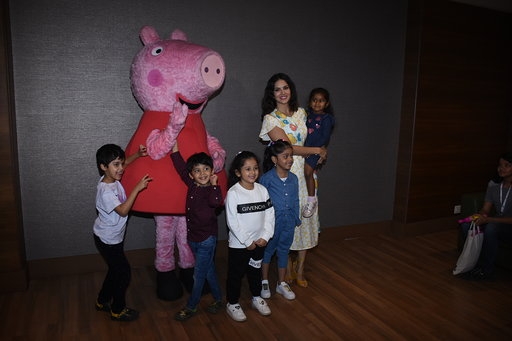 Mumbai: Actress Sunny Leone with her daughter  Nisha Kaur Weber at Viacom 18 'Peppa Pig Musical' event in Mumbai on March 7, 2020. (Photo: IANS)