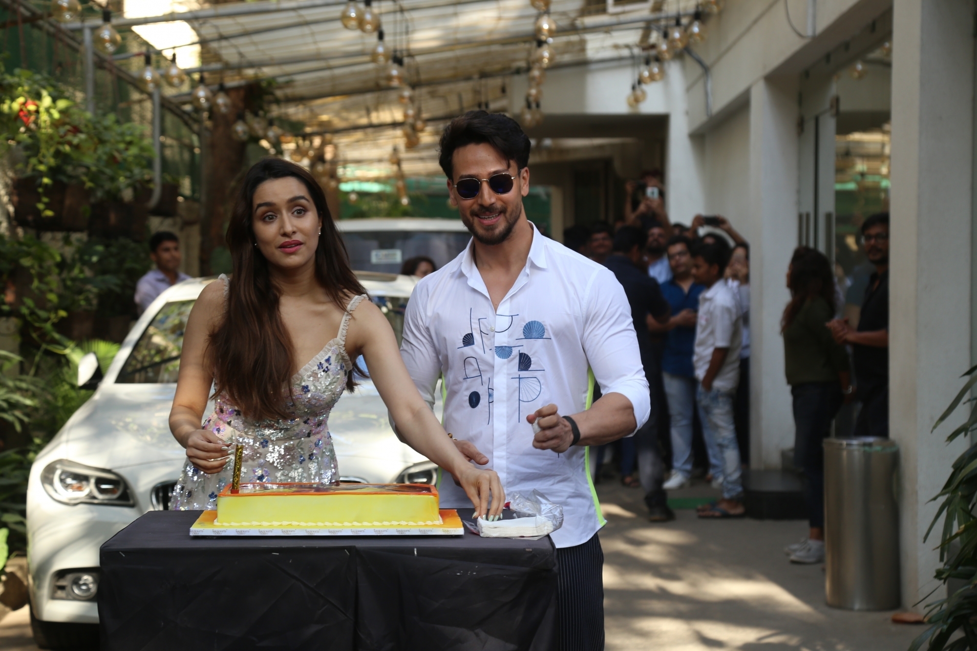 Mumbai: Actress Shraddha Kapoor accompanied by her "Baaghi 3" co-star Tiger Shroff, cuts her birthday cake during the promotions of their upcoming film in Mumbai on March 3, 2020. (Photo: IANS)
