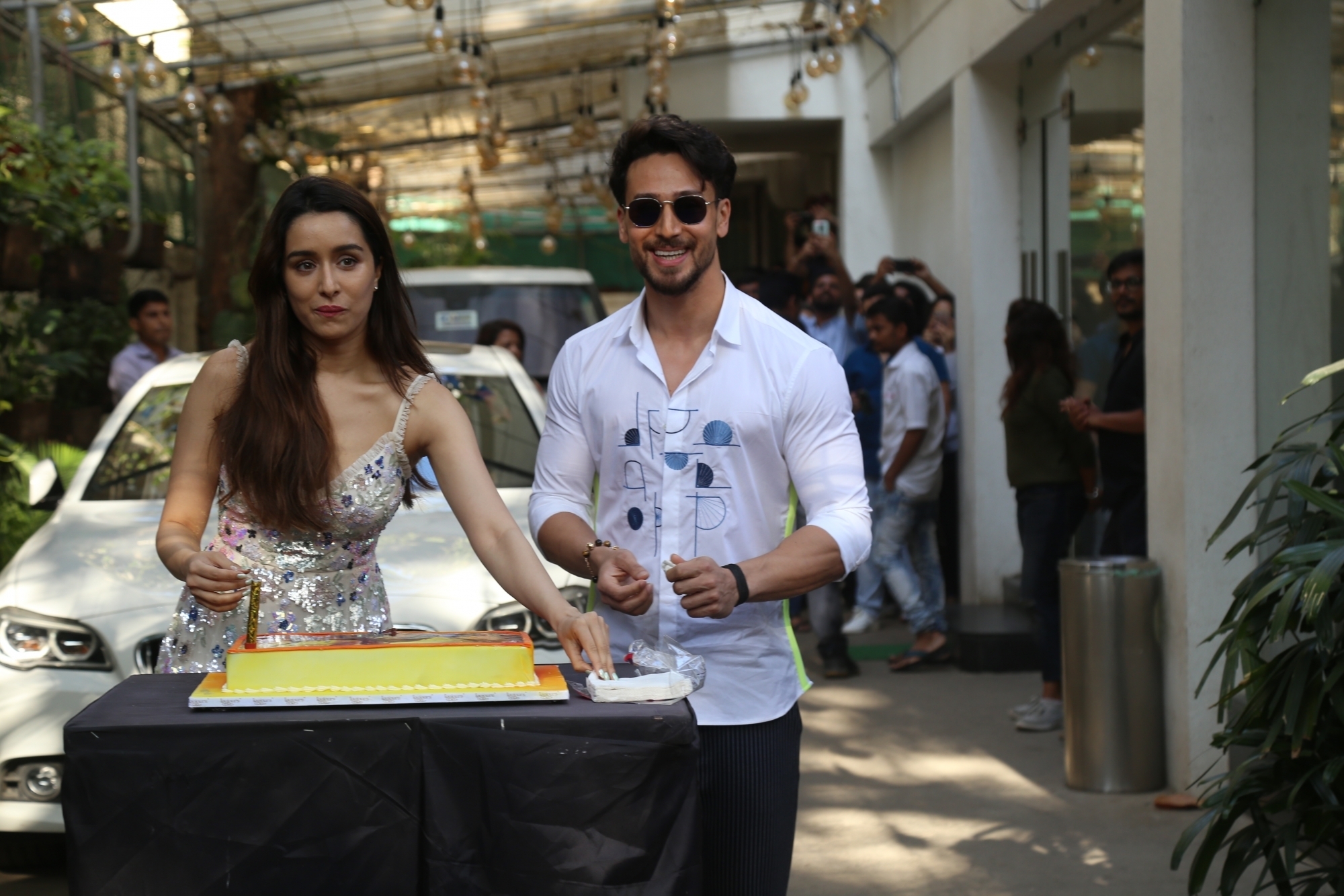 Mumbai: Actress Shraddha Kapoor accompanied by her "Baaghi 3" co-star Tiger Shroff, cuts her birthday cake during the promotions of their upcoming film in Mumbai on March 3, 2020. (Photo: IANS)