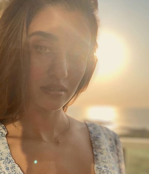 Actress Disha Patani treated her fans with a stunning photograph of herself. Disha took to Instagram, where she shared a string of photographs. In one image, the "Baaghi 2" star can be seen wearing a white floral summer dress.In the other photograph, she shared a sun-kissed selfie of himself.