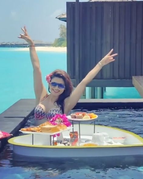 Urvashi Rautela's bikini breakfast in the pool.