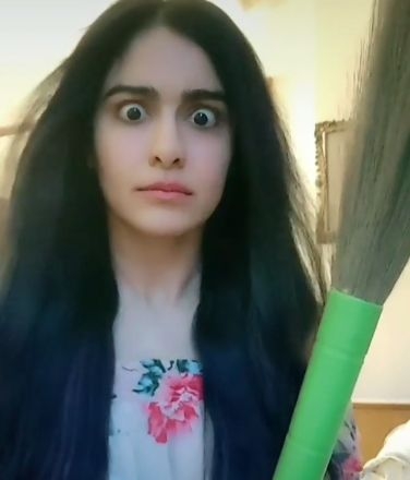 Adah Sharma poses with 'jhaadu' amid COVID-19.