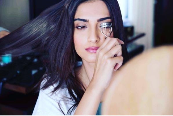 Sonam considers curling eyelashes an 'impossible task'.