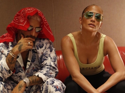 Jennifer Lopez teases new music with Maluma.