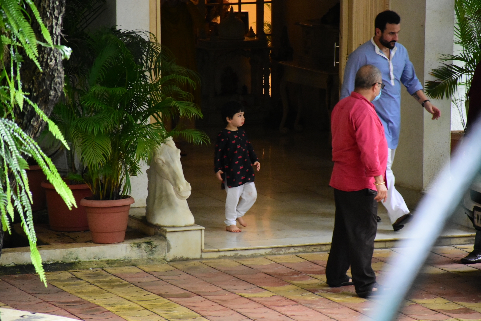 Mumbai: Actor Saif Ali Khan and his son Taimur Ali Khan during Raksha Bandhan celebrations at Raj Kapoor's house, in Mumbai on Aug 3, 2020. (Photo: IANS)