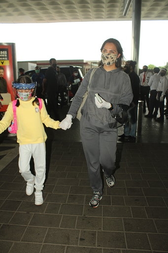 Mumbai: Actress Lara Dutta seen with her daughter Saira Bhupathi at Chhatrapati Shivaji Maharaj International Airport as she leaves for the UK for the shooting of her upcoming film "Bell Bottom" from Mumbai on Aug 6, 2020. (Photo: IANS)