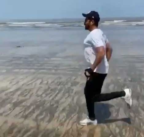 Anil Kapoor turns beach into workout spot.
