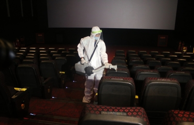 New Delhi: Sanitisation drive underway at the INOX cinema hall in New Delhi on Oct 13, 2020. Cinema halls in the national capital shall reopen from October 15 amid the Covid-19 pandemic as part of Unlock 5.0. (Photo: IANS)