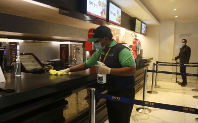 New Delhi: Precautions against COVID-19 in place at the INOX cinema hall in New Delhi on Oct 13, 2020. Cinema halls in the national capital shall reopen from October 15 amid the Covid-19 pandemic as part of Unlock 5.0. (Photo: IANS)