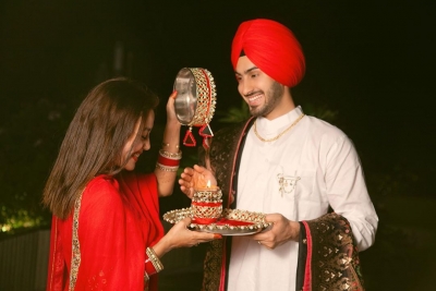 Neha Kakkar shares glimpses of first Karwa Chauth with husband Rohanpreet.
