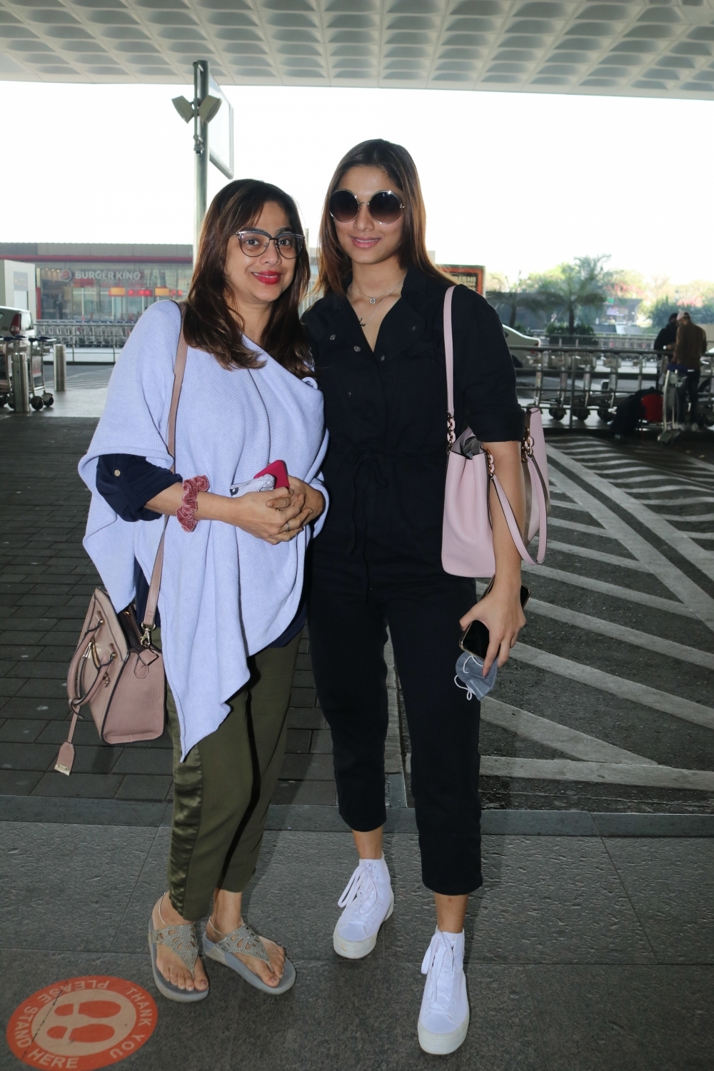 Mumbai: Saiee Manjrekar with her mom Medha Manjrekar seen at Airport on Wednesday, 27 January 2021. (Photo: IANS)