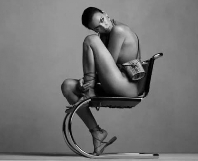 Supermodel Irina Shayk has ditched her clothes and bared it all for a new campaign of a fashion brand. The 33-year-old model went nude in a new campaign to promote Calvin Klein handbags.