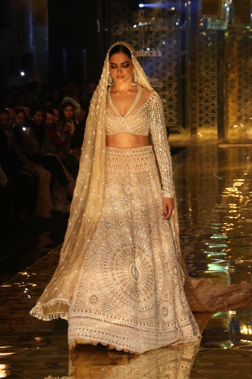 Mumbai: Actress Deepika Padukone showcases a creation of fashion designer Abu Jani-Sandeep Khosla during a fashion show in Mumbai, on Sep 5, 2019. (Photo: IANS)