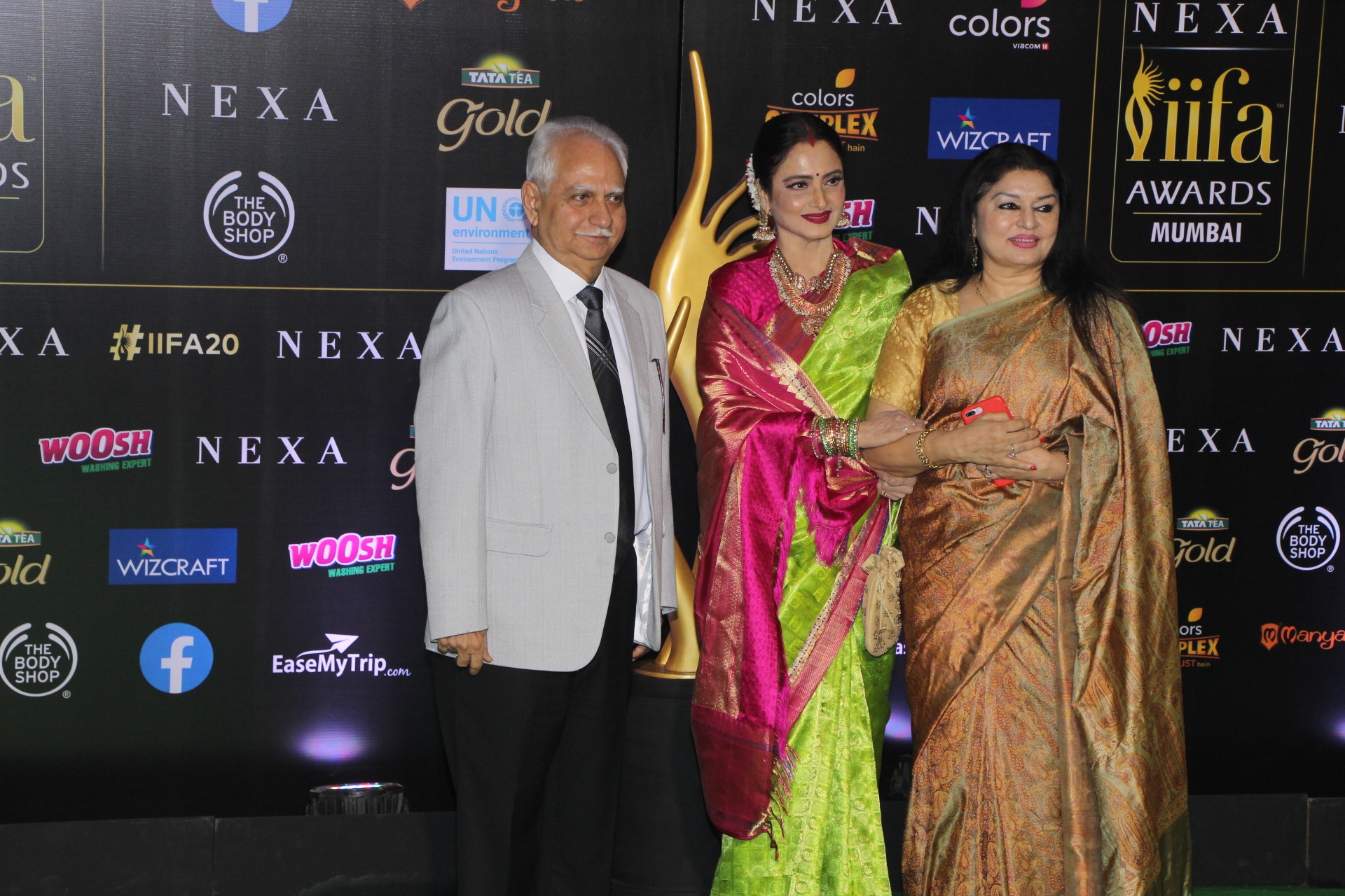 Mumbai: Actress Rekha with filmmaker Ramesh Sippy and his wife Kiran Juneja at the Green Carpet of 20th IIFA Awards, in Mumbai on Sep 18, 2019. (Photo: IANS)