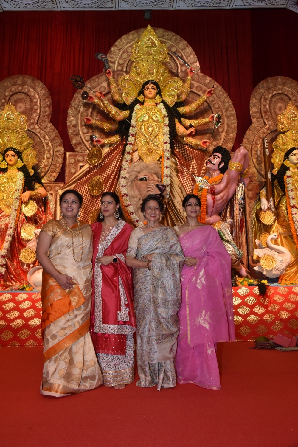 Mumbai: Actresses Kajol and Tanishaa Mukerji with thier mother Tanuja at a Durga Puja pandal in Juhu Mumbai on Oct 4, 2019. (Photo: IANS)