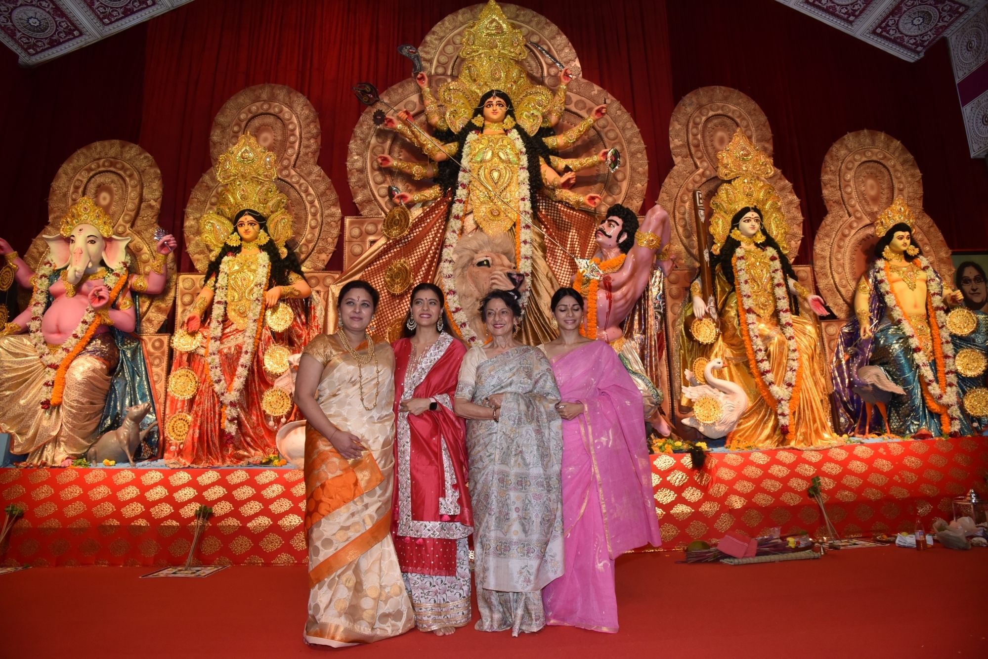 Mumbai: Actresses Kajol and Tanishaa Mukerji with thier mother Tanuja at a Durga Puja pandal in Juhu Mumbai on Oct 4, 2019. (Photo: IANS)