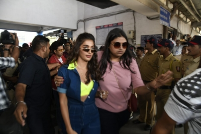 Mumbai: Actress Pooja Hegde arrives at Borivali railway station to travel by a special promotional train from Mumbai to Delhi as part of 