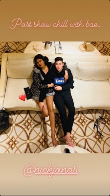 Actress Priyanka Chopra took to Instagram to show how she likes to cuddle with her husband and pop star Nick Jonas after a concert night.