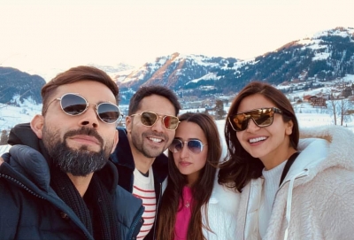 Virat Kohli and Anushka Sharma are in Switzerland these days to usher New Year, and who should they spot painting the town red but Varun Dhawan and his girlfriend Natasha Dalal! Not just Virat and Anuska, Varun also bumped into the Kapoor sisters Karisma and Kareena in Switzerland.