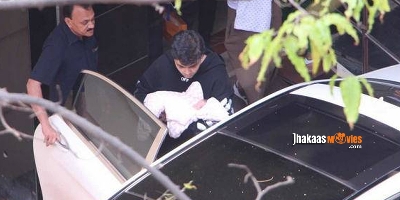 Karan Johar Takes His Twins Home