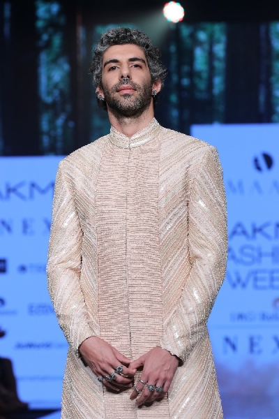 Mumbai: Actor Jim Sarbh walks the ramp showcasing an outfit from fashion designer Sahib Bhatia's label Amaare at the Lakme Fashion Week Summer/Resort 2020 grand finale, in Mumbai on Feb 16, 2020. (Photo: IANS)