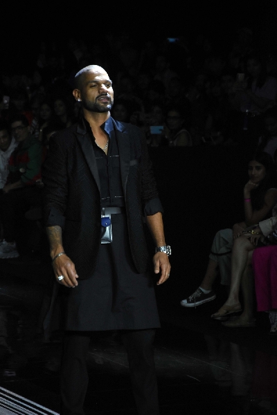 Mumbai: Indian cricketer Shikhar Dhawan showcases the creation of Fashion designer Samant Chauhan on Day 4 of the Lakme Fashion Week Summer/Resort 2020, in Mumbai on Feb 14, 2020. (Photo: IANS)
