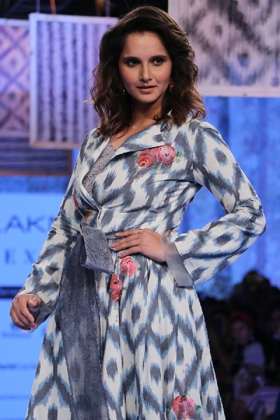 Mumbai: Indian Tennis star and showstopper Sania Mirza walks the ramp for designer Rina Singh on Day 3 of the Lakme Fashion Week Summer/Resort 2020, in Mumbai on Feb 13, 2020. (Photo: IANS)