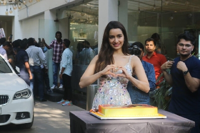 Actress Shraddha Kapoor turned 33 on Tuesday, and she had a mostly busy birthday. Shraddha started her day with a visit to an NGO to spend some time with special kids and senior citizens. She cut the cake with the kids in the morning. Then it was time to be surprised by her "Baaghi 3" co-star Tiger Shroff and the film's production team, who had arranged a grand surprise for her.