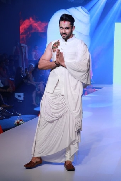 Mumbai: Actor Abhishek Bajaj showcases the creation of fashion designer Rohit Verma at the Bombay Times Fashion Week in Mumbai on March 13, 2020. (Photo: IANS)