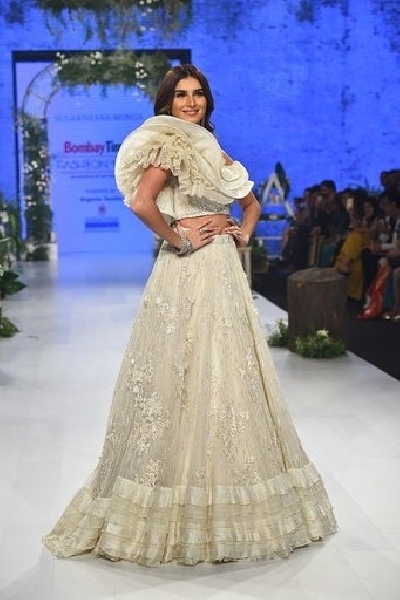 Mumbai: Actress Tara Sutaria poses with fashion designer Sulakshana Monga on Day 3 of the Bombay Times Fashion Week, in Mumbai on March 15, 2020. (Photo: IANS)