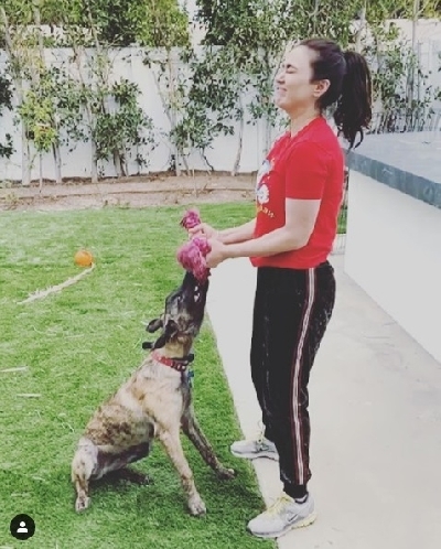 Preity Zinta workout with pet dog.