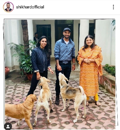 Shikhar Dhawan with Maneka Gandhi.