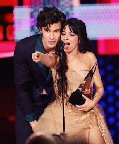 Shawn Mendes, Camila Cabello chill on a swing.