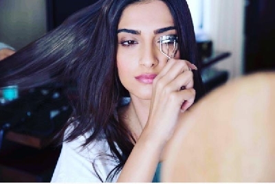 Sonam considers curling eyelashes an 'impossible task'.