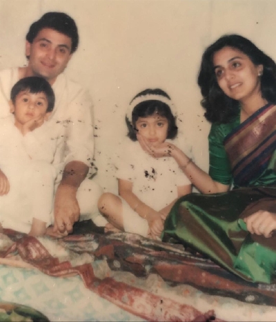 Throwback Thursday: Cute little Ranbir sits in Rishi Kapoor's lap.