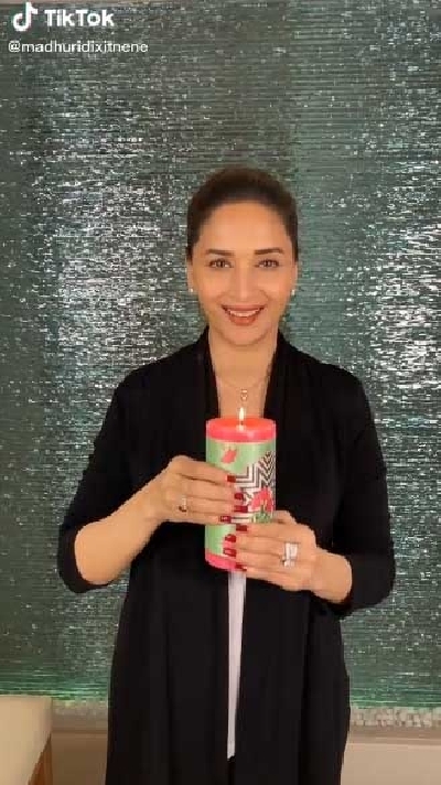Madhuri Dixit's dance with a candle to spread positivity.