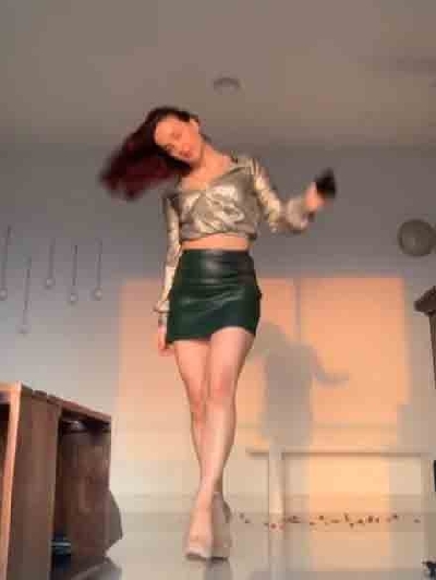 Elli AvrRam catwalks in style in new video.