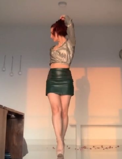 Elli AvrRam catwalks in style in new video.