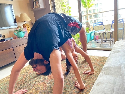 Rajniesh Duggal celebrates Yoga Day with daughter.
