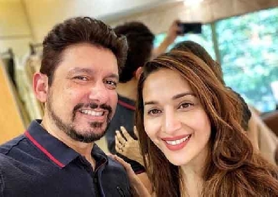 Lockdown diaries: Madhuri experiments with husband's hairstyle.