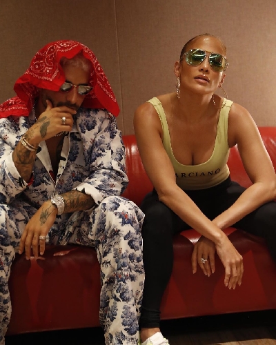 Jennifer Lopez teases new music with Maluma.