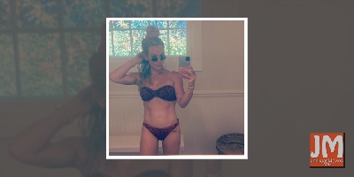Hilary Duff flaunts toned abs